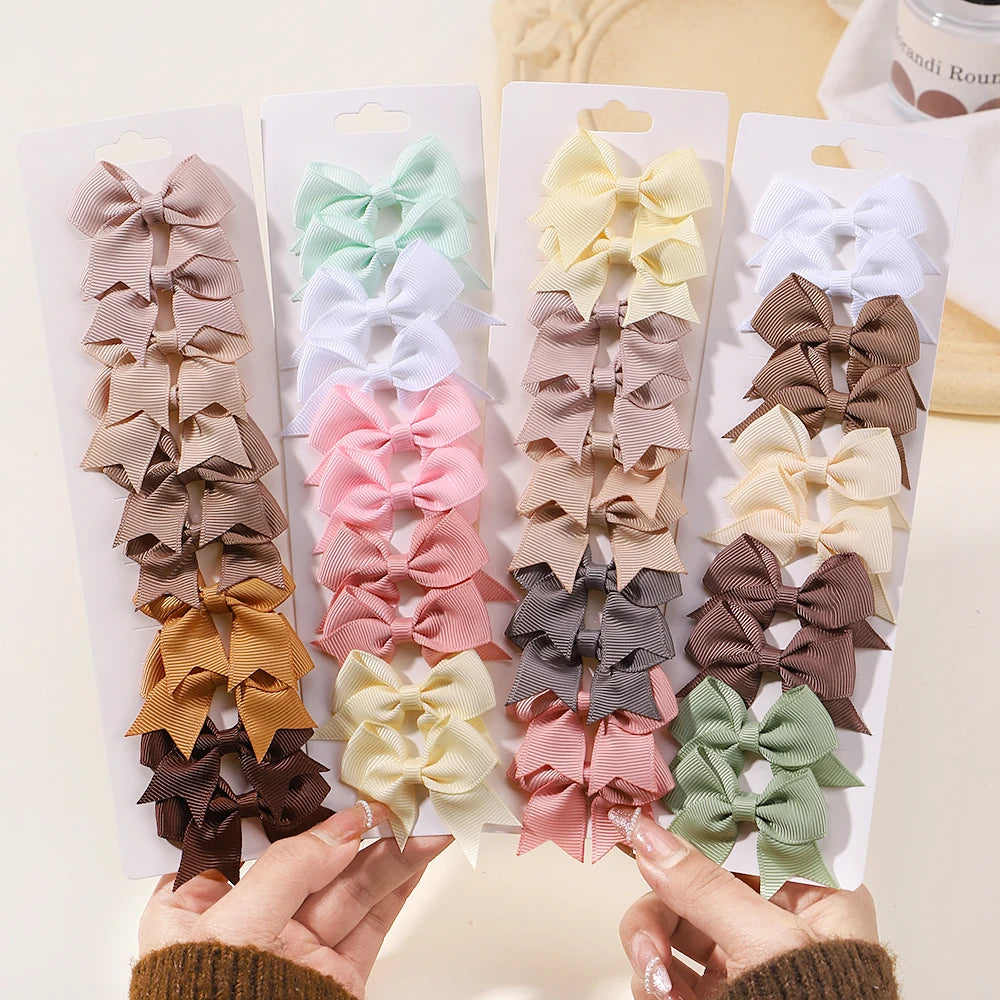 Pinces à cheveux nœud papillon faites à la main pour bébés filles, nœuds de bébé, épingle à cheveux ruban solide, barrettes, accessoires pour cheveux pour enfants, lot de 10 pièces